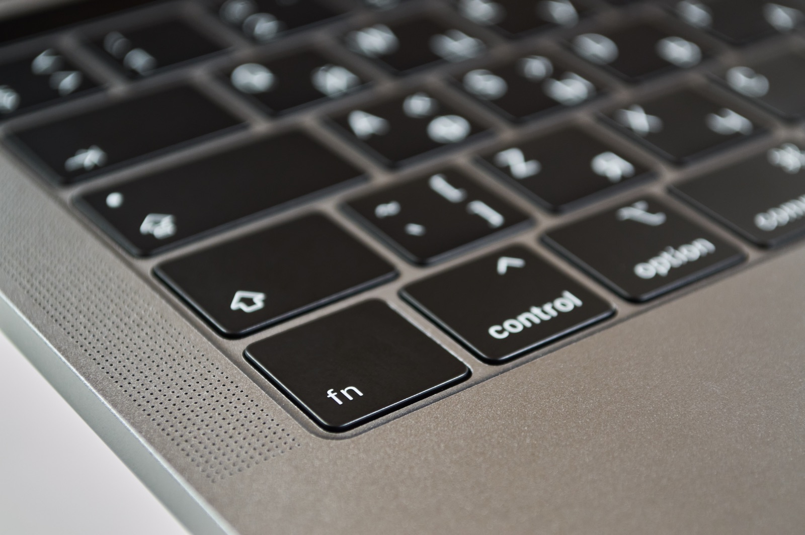 Close-up of a MacBook keyboard with the control and modifier keys in focus - the keys a hyper key is built from.